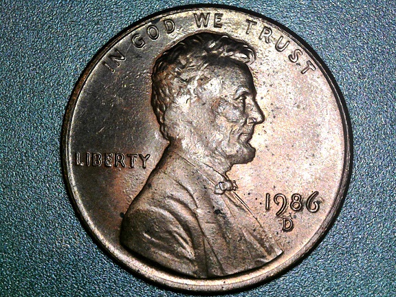 Pocket-Change1986-D-LMC-Missing-Ear->-Greaser-Or-Damage-?